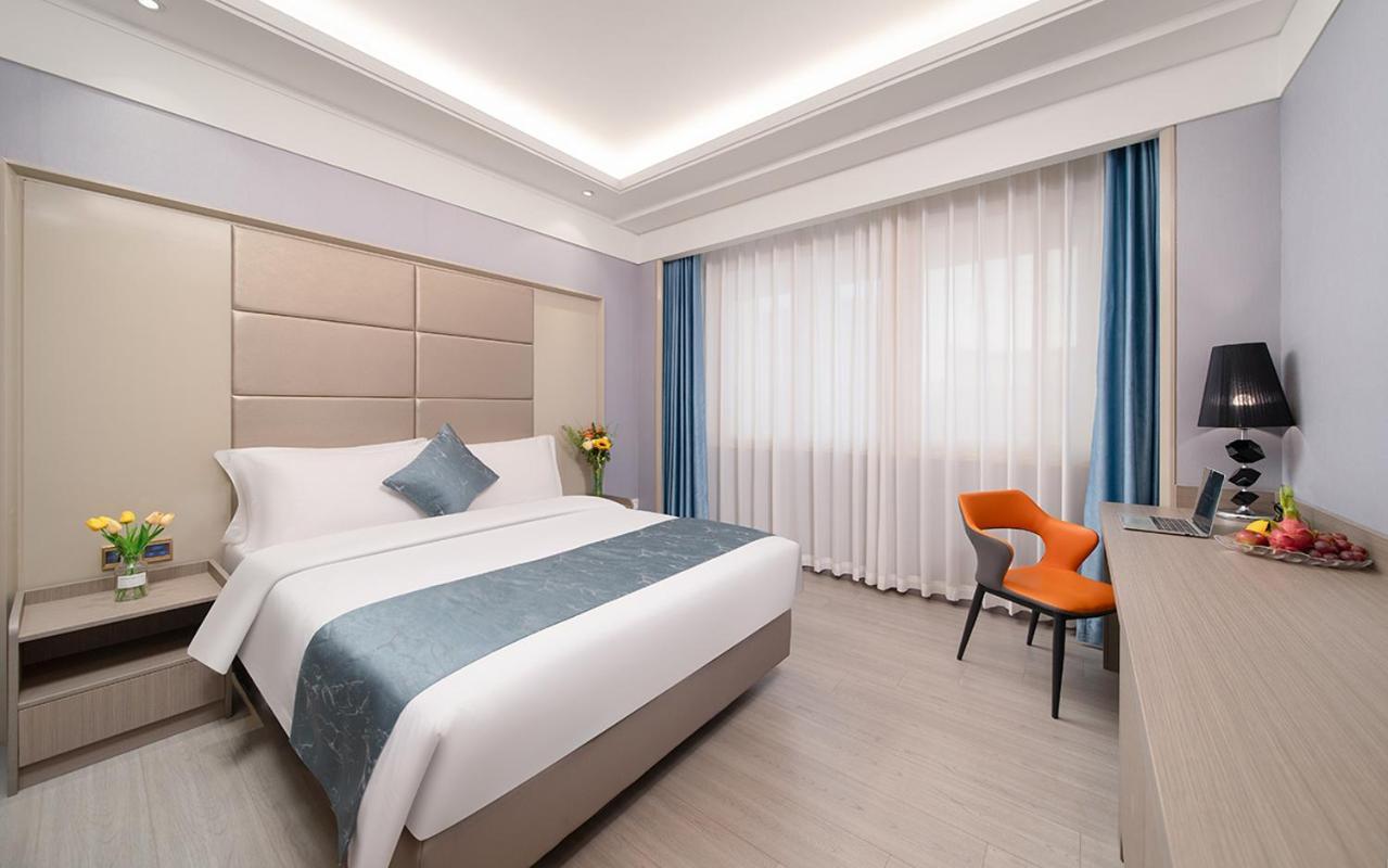 Отель Ramada Shenzhen Baoan Экстерьер фото